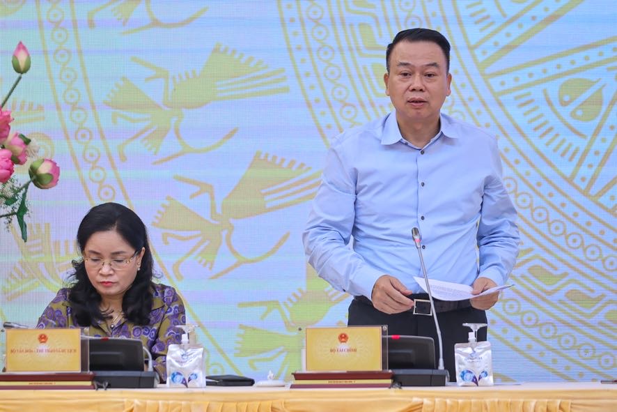 Thứ trưởng Bộ Tài chính Nguyễn Đức Chi trả lời câu hỏi của phóng viên về thí điểm giao dịch tài sản mã hóa